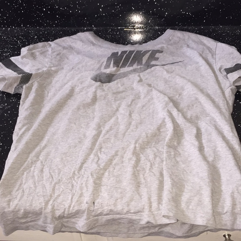 It’s a gray Nike shirt
